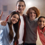 teen-kids-smile-at-camera