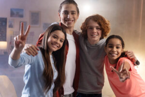 teen-kids-smile-at-camera