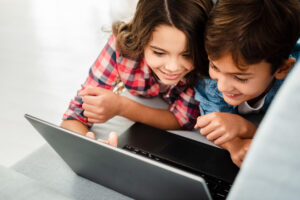 two-kids-on-laptop